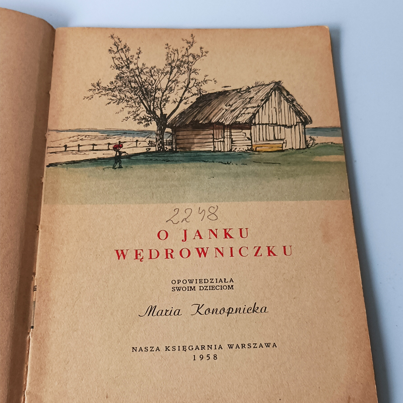 Książka „O Janku Wędrowniczku” Maria Konopnicka – Nasza Księgarnia 1958 (Vintage) Strona tytułowa książki z 1958 roku z klasycznym rysunkiem wiejskiej chaty i drzewa, wydawnictwo Nasza Księgarnia.